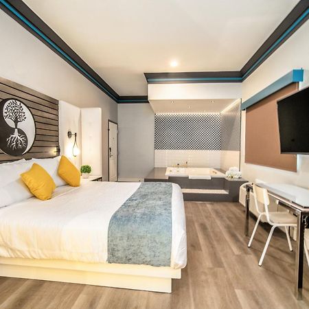 Aspire Inn Studios & Spas เบลฟลาวเวอร์ ภายนอก รูปภาพ