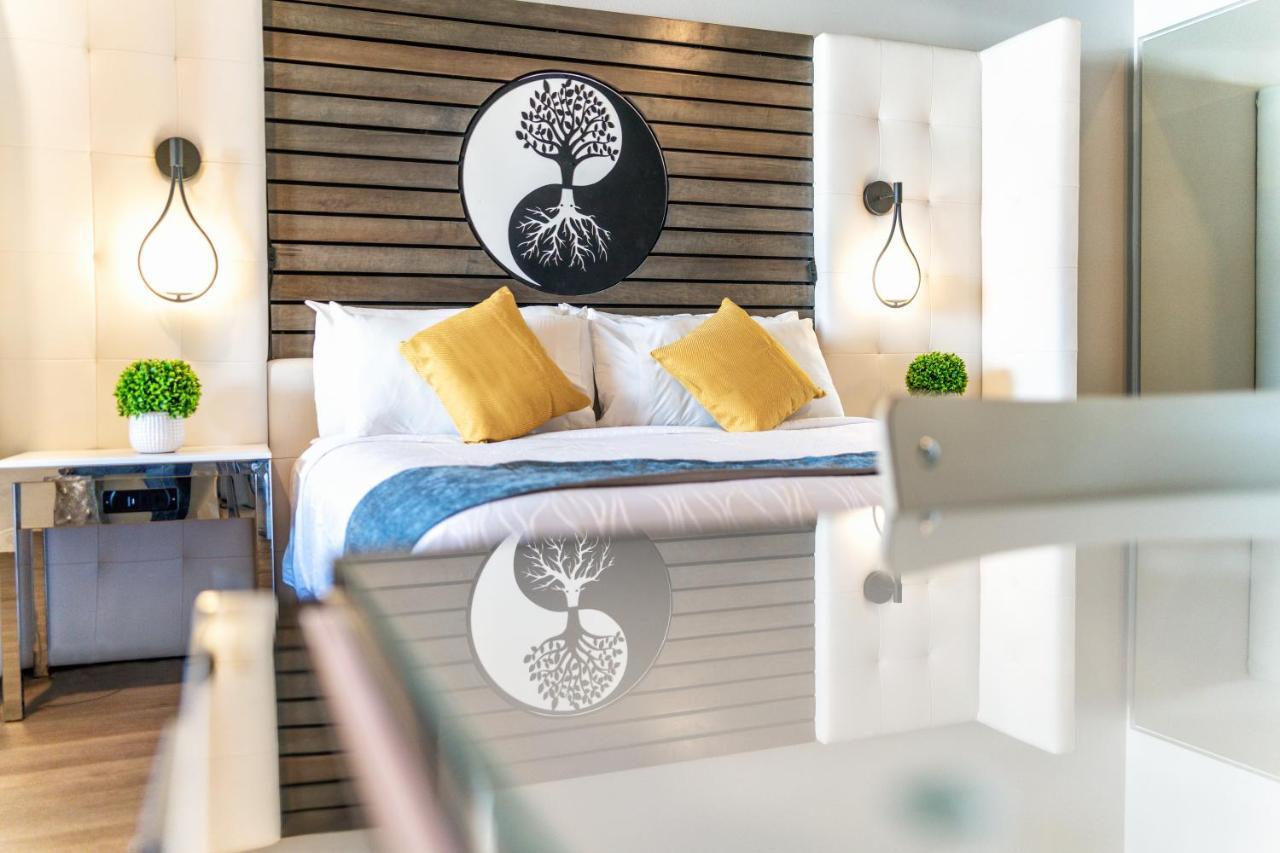 Aspire Inn Studios & Spas เบลฟลาวเวอร์ ภายนอก รูปภาพ