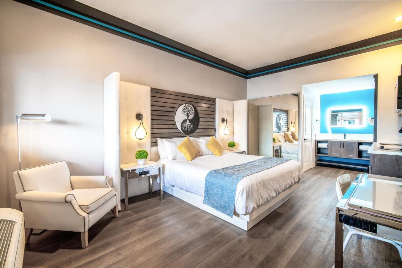 Aspire Inn Studios & Spas เบลฟลาวเวอร์ ภายนอก รูปภาพ