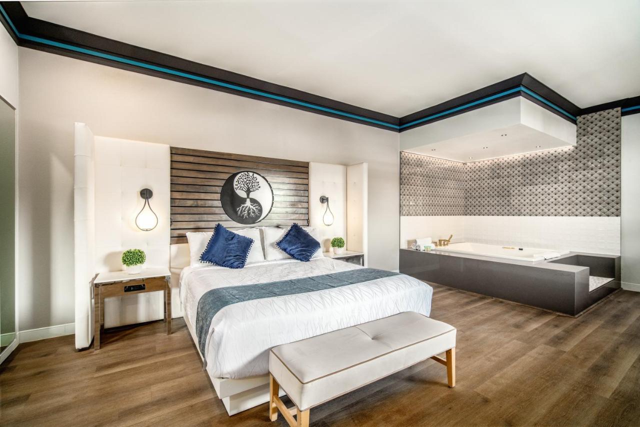 Aspire Inn Studios & Spas เบลฟลาวเวอร์ ภายนอก รูปภาพ