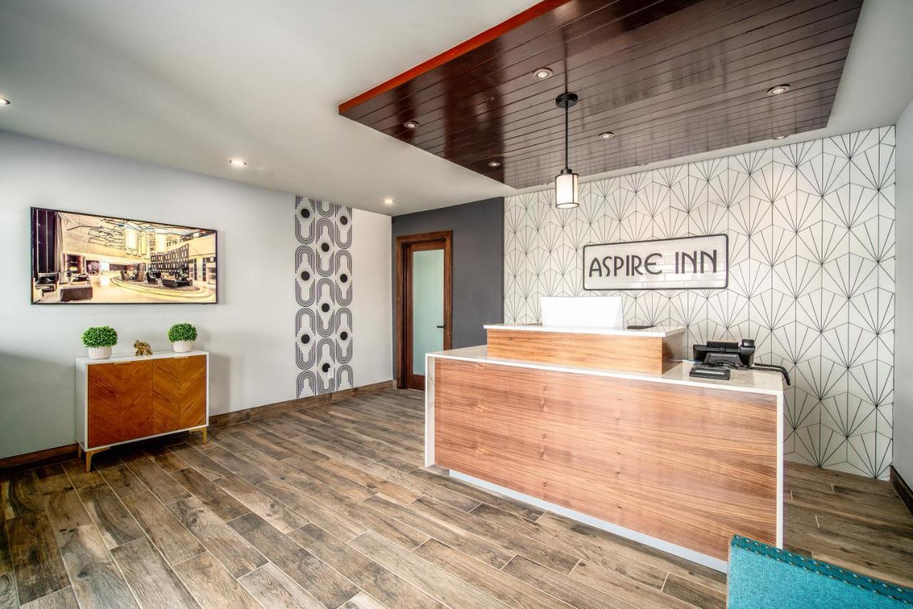 Aspire Inn Studios & Spas เบลฟลาวเวอร์ ภายนอก รูปภาพ