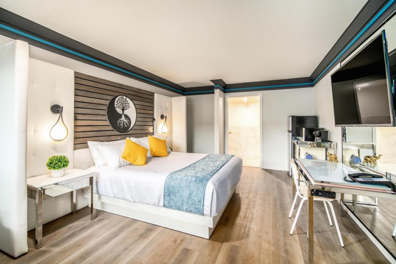 Aspire Inn Studios & Spas เบลฟลาวเวอร์ ภายนอก รูปภาพ