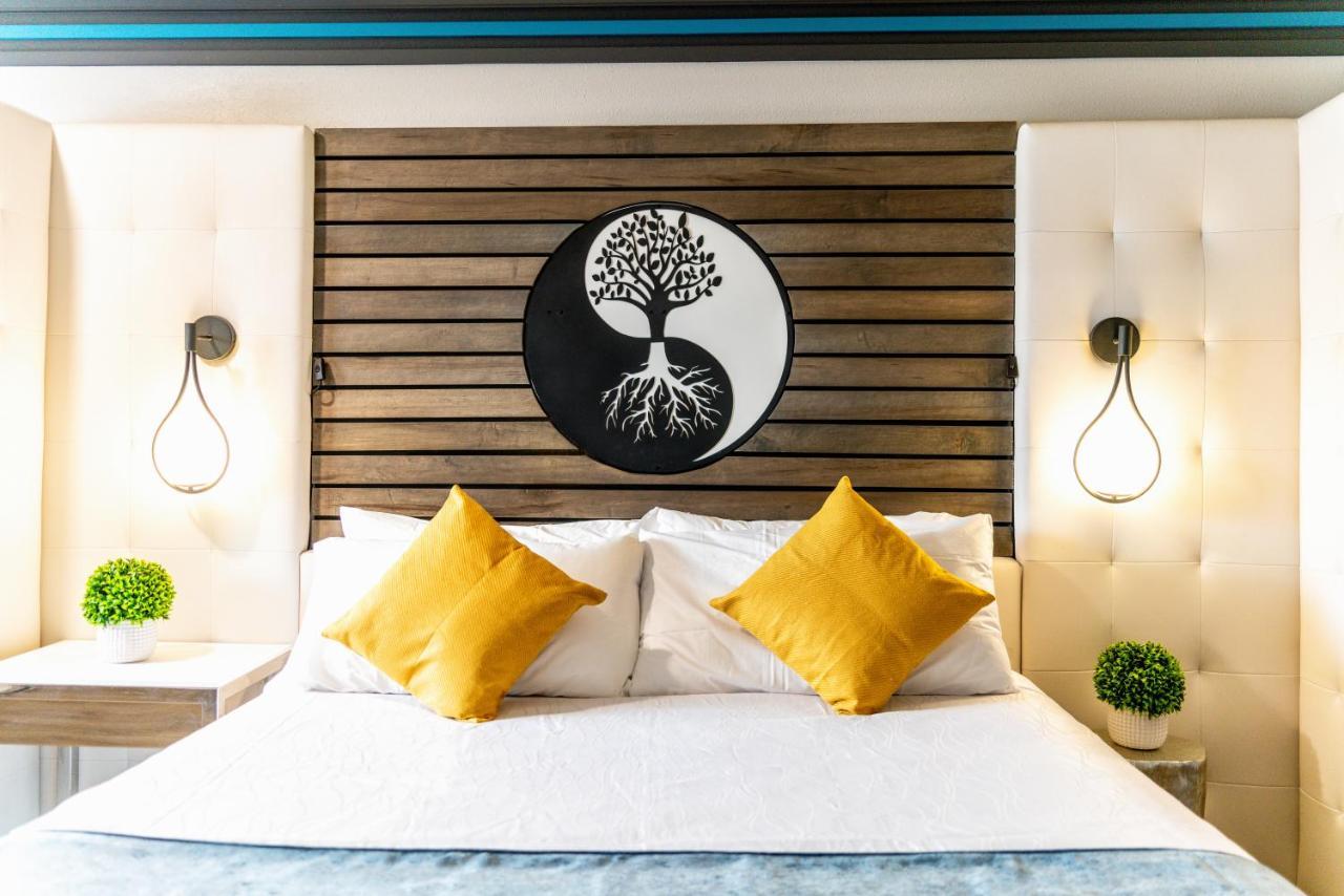 Aspire Inn Studios & Spas เบลฟลาวเวอร์ ภายนอก รูปภาพ